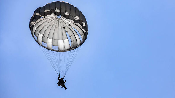 Army Staff Sgt. Robert Pelvzarski descends to the Glen Rock Drop Zone during Leapfest in West Kingston, R.I., August 1, 2024. Leapfest is the largest and longest-running international static line parachute training event and competition. Courtesy of Department of Defense. Credit: Army Sgt. 1st Class Austin Berner