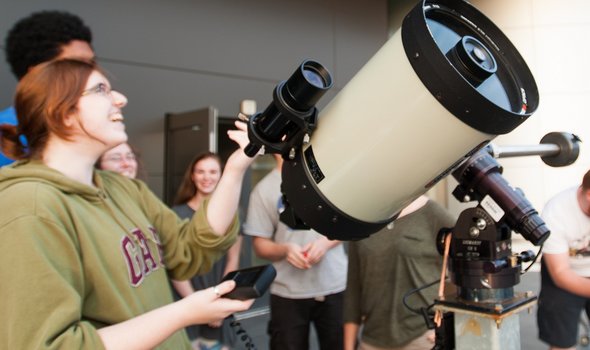 students using telescope