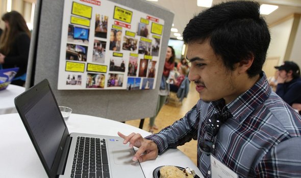 student working on computer