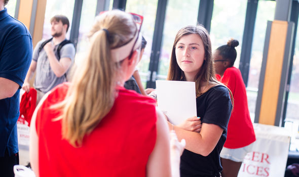 2 people talking at a Transfer Orientation event