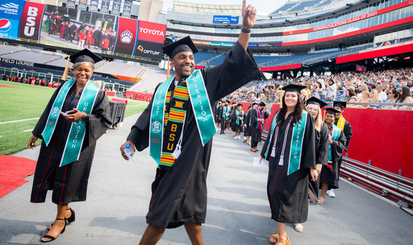 BSU undergraduates processing at afternoon undergraduate Commencement at Gillette Stadium