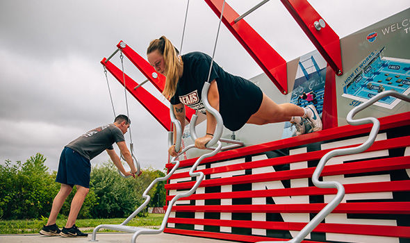Students working out on the outdoor fitness court