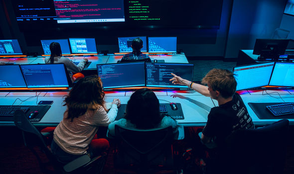 BSU Cyber range students collaborating in a mock cyber attack
