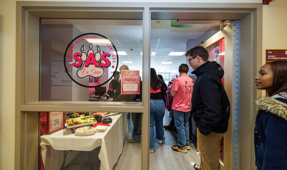 Photo looking into Student Accessibility Services office from hallway in Rondileau Student Union