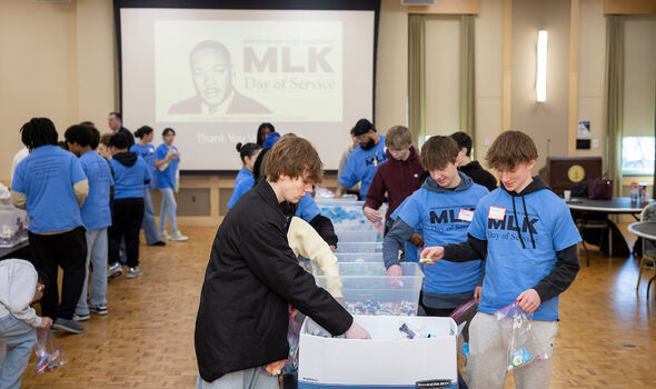 student volunteers assembling bags of items to give to those in need at BSU MLK Day of Service