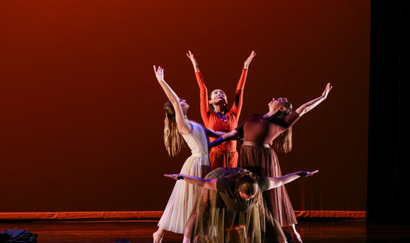 4 female dancers on stage in a dance production