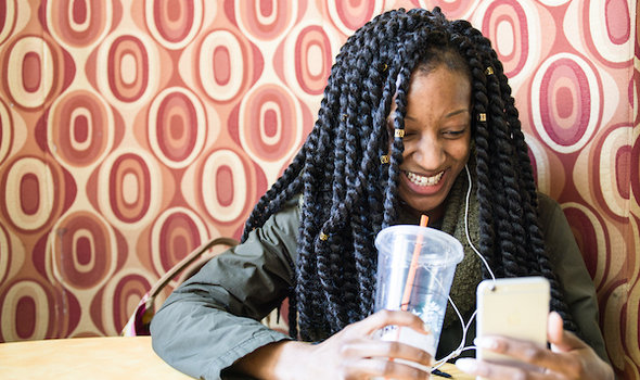A student uses her phone