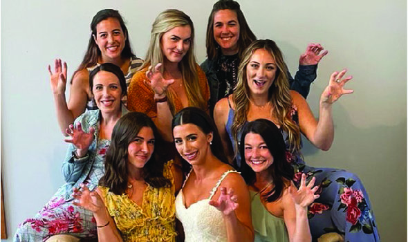 group of cheerleading alumni at an alumna's wedding