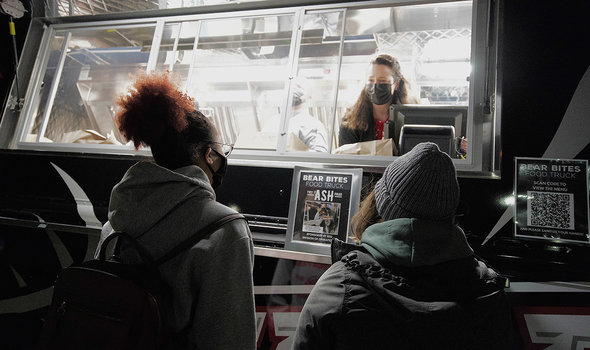 Students ordering dinner at the Bear Bites food truck