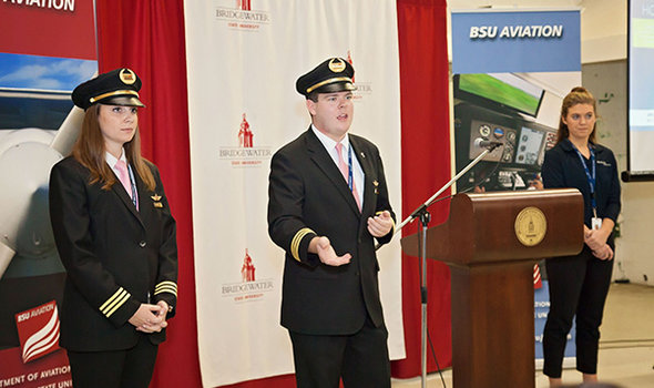 A recruitment presentation by Endeavor Airlines pilots, 1 male and 1 female