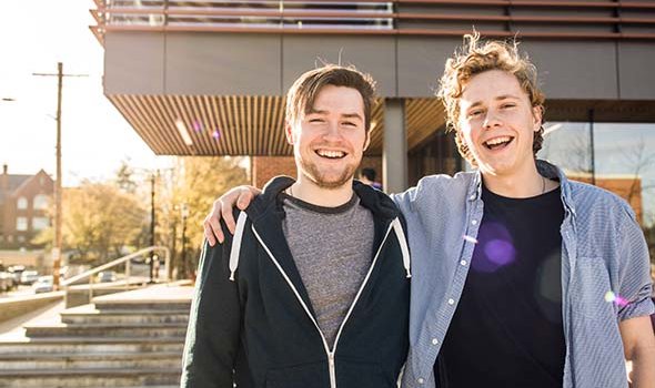 Undergraduate students pose outside of the Math and Science Center