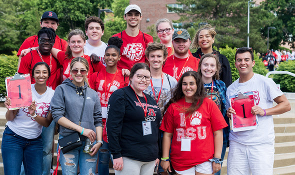 An orientation group posing and smiling