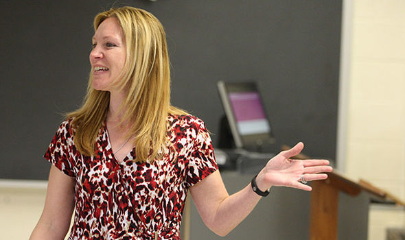 a BSU graduate student giving a presentation in class