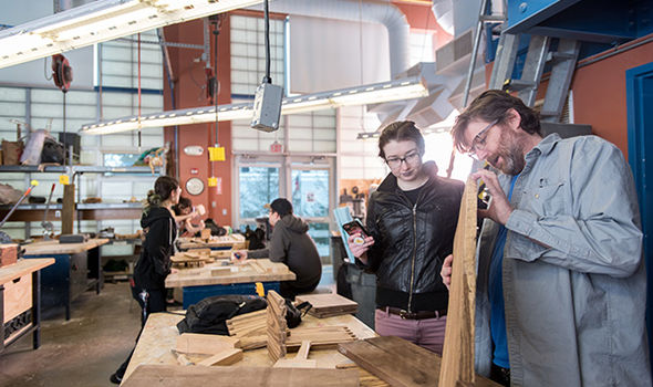 students in the woodworking shop
