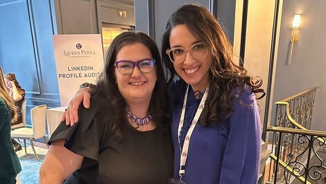 Laura Viola Maccarone and Stephanie Boyle embrace.