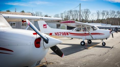 Two planes sit on the ramp.