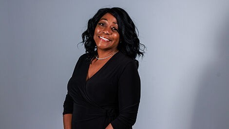 Portrait photo of Tiffony Cesero in front of a white backdrop
