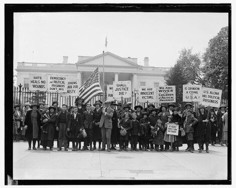 A group of adults and children gathered in front of the White House in 1922 to protest for political amnesty