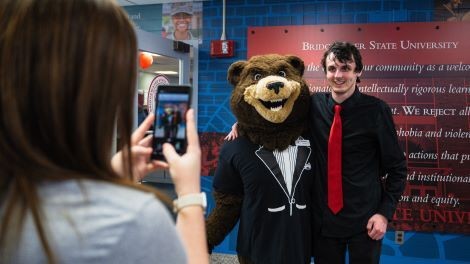 Dom Zullo poses for a photo with Bristaco.
