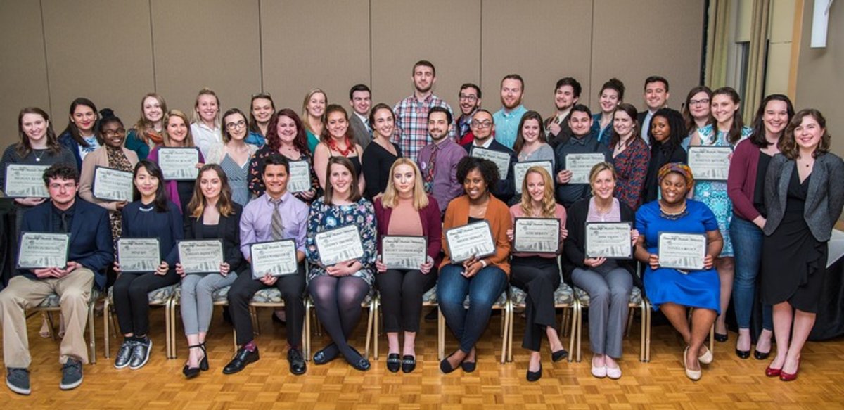 Spring 2018 graduating honors students holding certificates Spring 2018 graduating honors students holding certificates