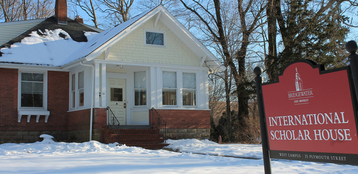 International Scholar House front view with sign and snow on the ground
