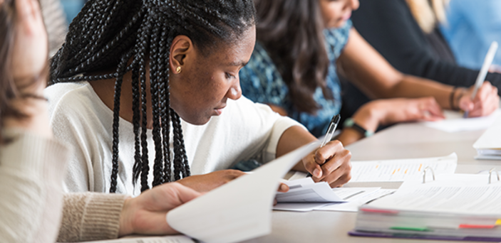 Image of students sitting in a classroom