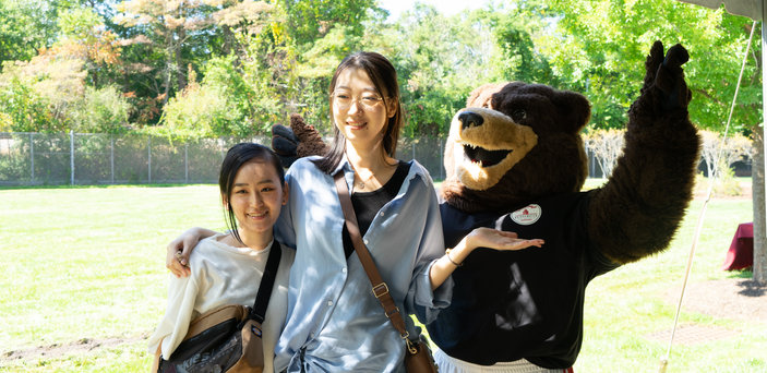 Students pose with Bristico at convocation