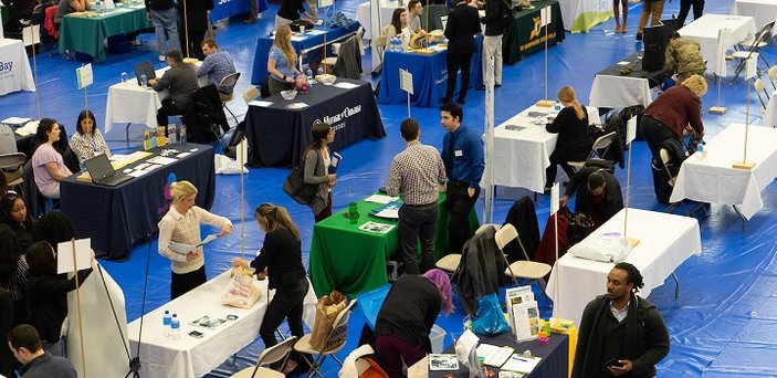 Students meet with employers at the Job and Internship Fair.