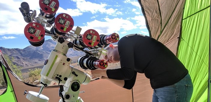 A student adjusts equipment