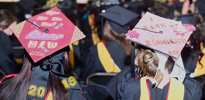 Grads show their creativity on their caps