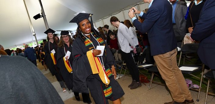 Students walk into the ceremony