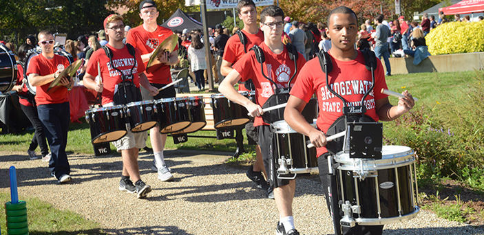 BSU Marching Band drummers leading Homecoming parade