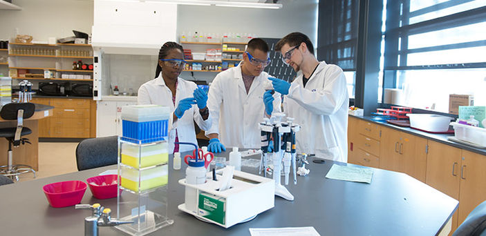 3 BSU students working in chemistry lab