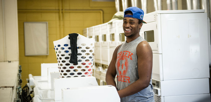 A student does his laundry