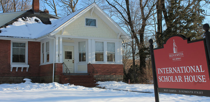 International Scholar House front view with sign and snow on the ground