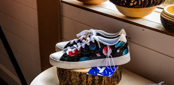 Shoes on display inside of the Rug Shack