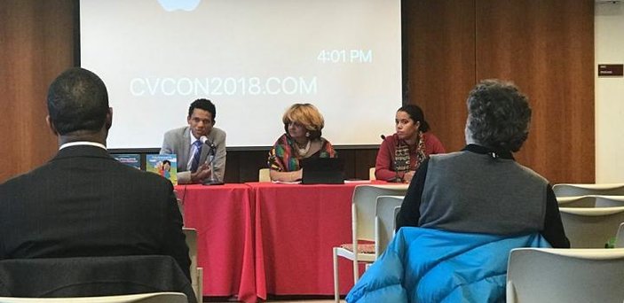 conference panel with audience