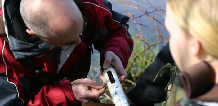 Watershed teams exploring microhabitats to study aquatic macroinvertebrate distribution