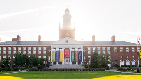 Boyden Hall with sunlight behind it