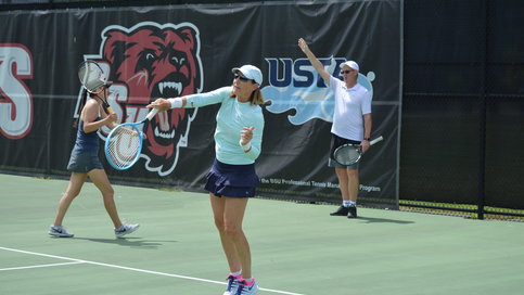 Students playing tennis
