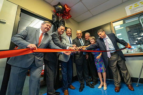Brockton and BSU officials cut the ribbon for the new office Brockton and BSU officials cut the ribbon for the new office