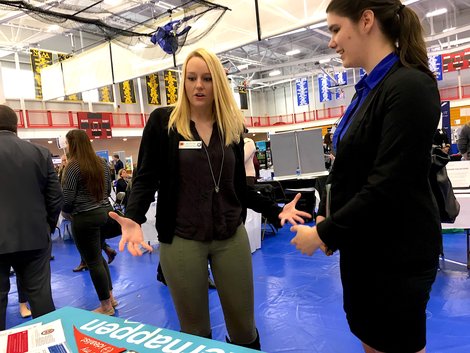 City Year Recruitment Manager Kristen Hill talks with junior City Year Recruitment Manager Kristen Hill talks with junior