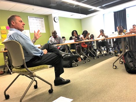 Paul Jean, left, speaks to Mandela fellows Paul Jean, left, speaks to Mandela fellows