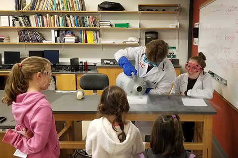 Will Coon and Zoe Hasham demonstrate an experiment for kids Will Coon and Zoe Hasham demonstrate an experiment for kids