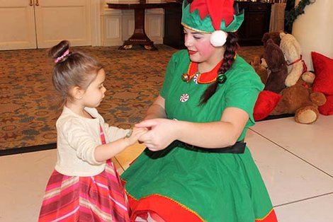 Elf Libby Lit dances with girl Elf Libby Lit dances with girl