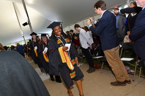 Graduates walk into the ceremony. Graduates walk into the ceremony.