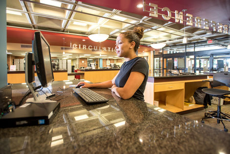 Student in the Maxwell Library