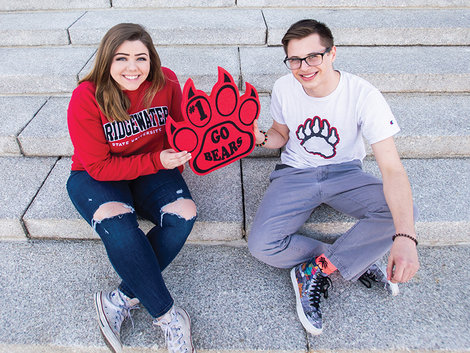 FIrst-generation students Anna Rice, '21, and Tyler Czyras, '22, take a break on the steps of Boyden Hall between their classes and jobs.
