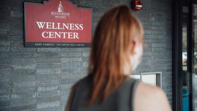Student walking into Wellness Center
