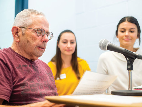 Daniel Medeiros takes part in a session of SPEAK OUT!, a program that addresses motor speech deficits associated with Parkinson’s disease, while BSU graduate students and program assistants Lauren Hayden, G’20, (left) and Rachel Lyons, ’18, G’20 look on
